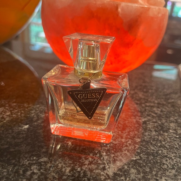 Guess Seductive perfume. Has some left in bottle. Fun and flirty. - Picture 1 of 6